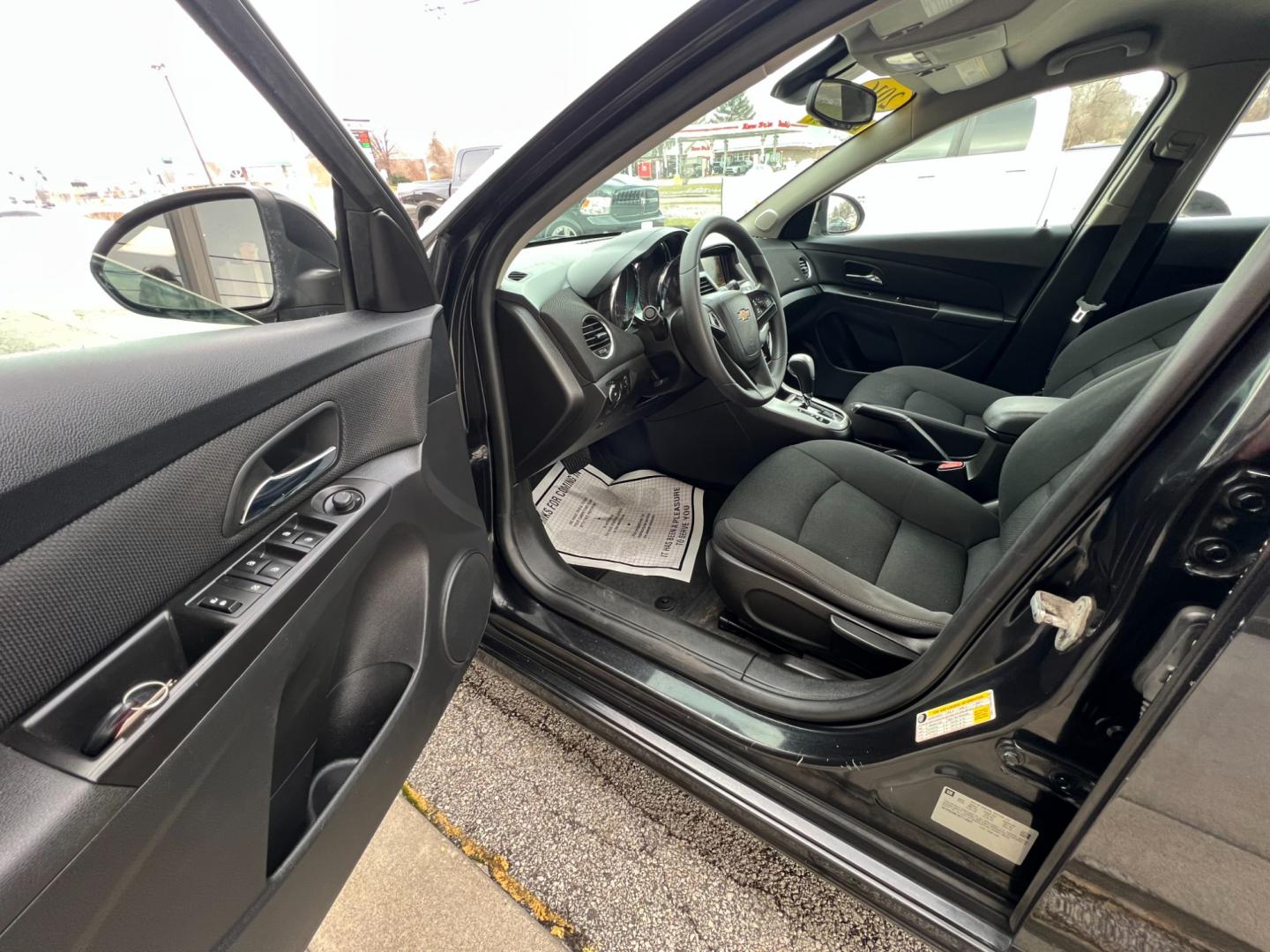 2014 Black Chevrolet Cruze LS Auto (1G1PA5SH5E7) with an 1.8L L4 DOHC 16V FFV engine, 6-Speed Automatic transmission, located at 1633 W Kimberly, Davenport, IA, 52806, (563) 323-5341, 41.559456, -90.598732 - Photo#5